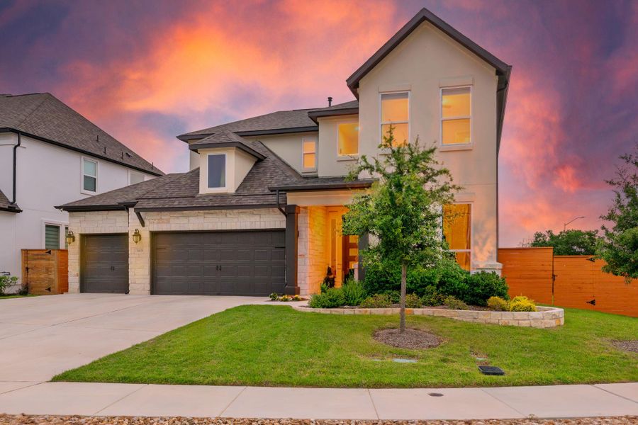 Front exterior of a new home in , Leander, TX, highlighting curb appeal (Image 22). Front exterior of a new home in , Leander, TX, highlighting curb appeal (Image 22).