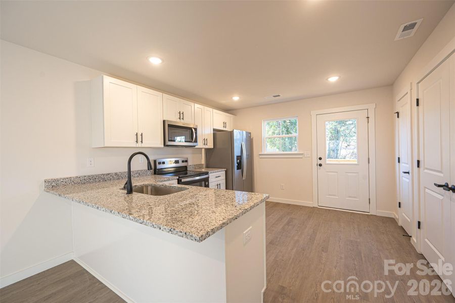 Furnished interior view inside a new home in , Hickory (Image 8).