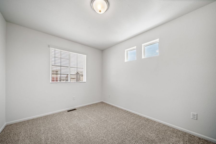 Spacious, unfurnished interior of a new home in Reunion, Commerce City (Image 13).
