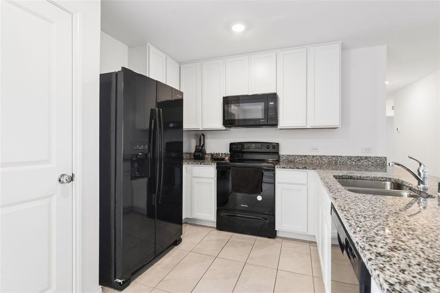 Furnished interior view inside a new home in Tillage Farms, Princeton (Image 8).