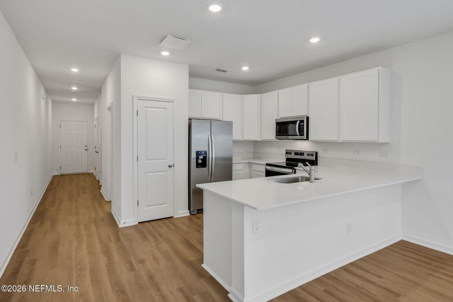 Furnished interior view inside a new home in , Jacksonville (Image 7).