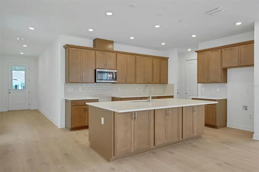 Furnished interior view inside a new home in Green Key Village, Lady Lake (Image 7).