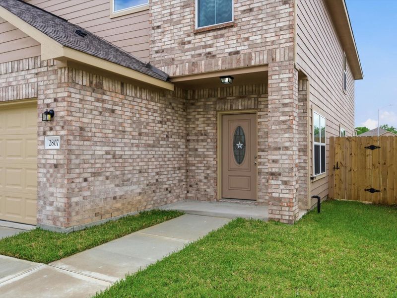Exterior details and patio area of a home in , Houston (Image 4).