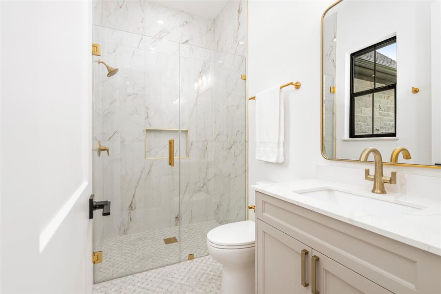 Second main-level bedroom with en-suite bathroom, full of designer finishes. Second main-level bedroom with en-suite bathroom, full of designer finishes.