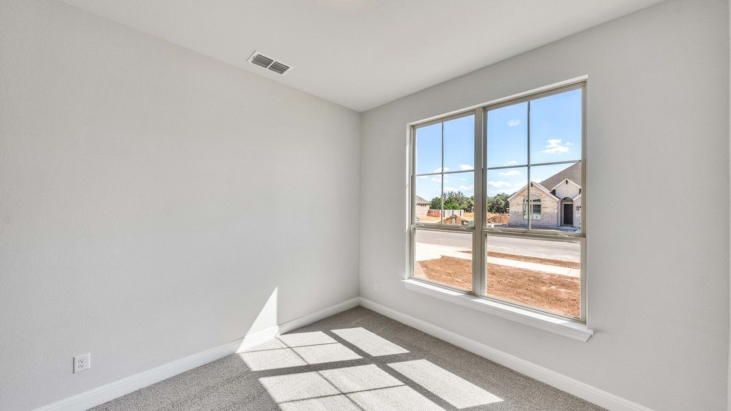Furnished interior view inside a new home in Hawkes Landing, Leander (Image 18).