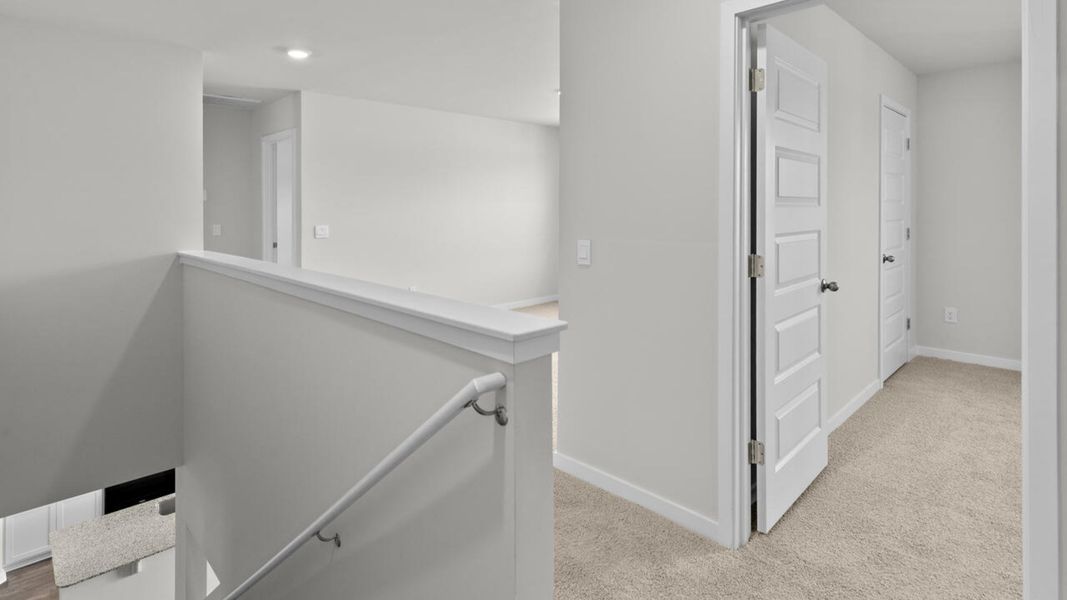Spacious, unfurnished interior of a new home in Sidbury Station, Castle Hayne (Image 21).