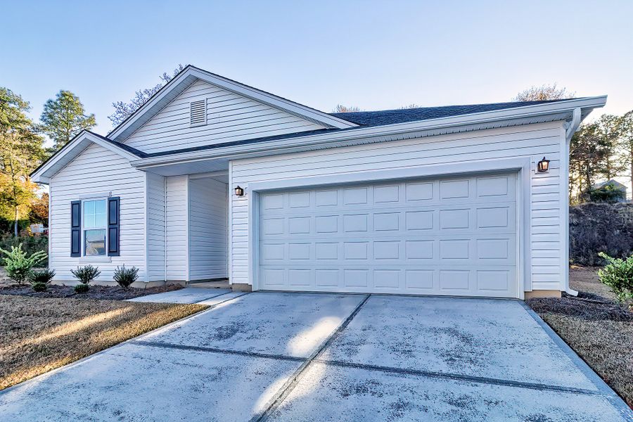 Front exterior of a new home in Emanuel Creek, West Columbia, SC, highlighting curb appeal (Image 20).