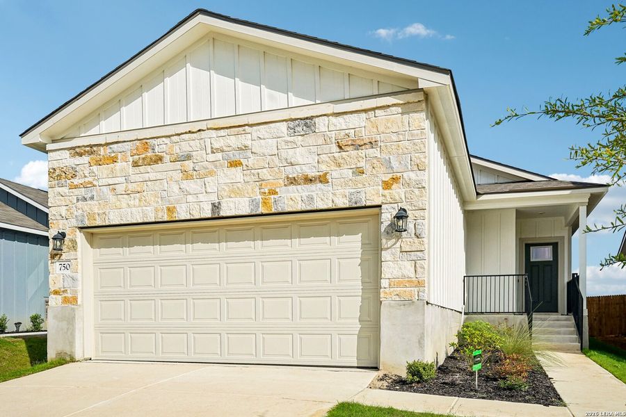 Front exterior of a new home in Highland Ridge, San Antonio, TX, highlighting curb appeal (Image 21). Front exterior of a new home in Highland Ridge, San Antonio, TX, highlighting curb appeal (Image 21).