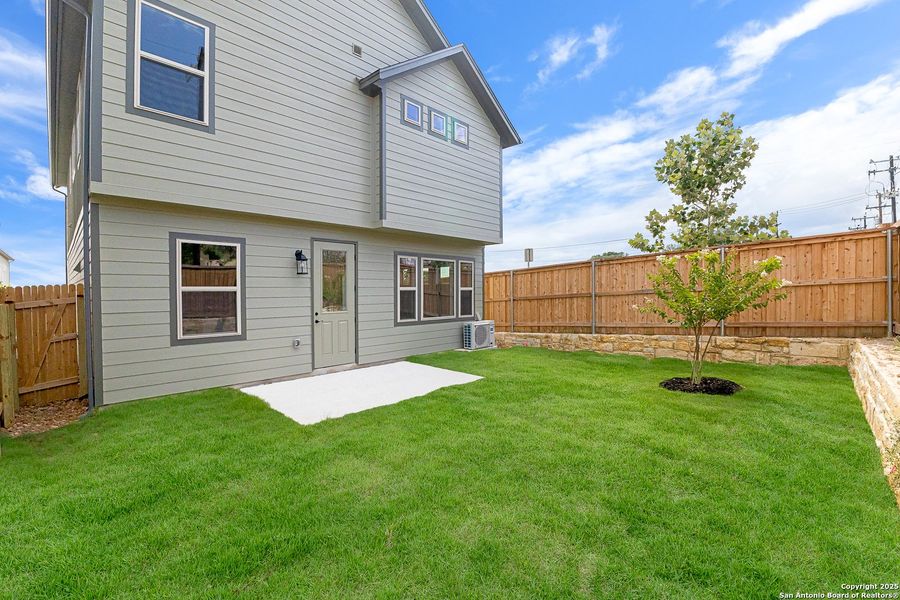 Front exterior of a new home in Trilogy Grove, Leon Valley, TX, highlighting curb appeal (Image 2). Front exterior of a new home in Trilogy Grove, Leon Valley, TX, highlighting curb appeal (Image 2).