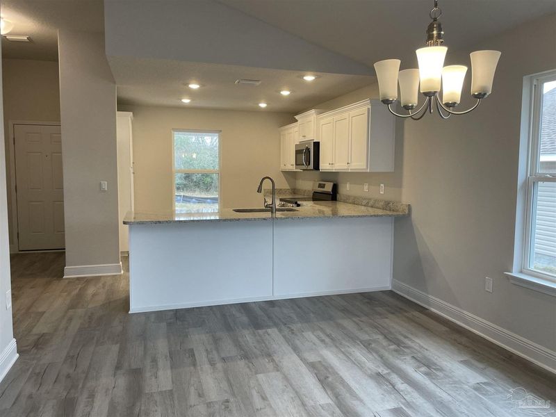 Furnished interior view inside a new home in Turtle Creek, Cantonment (Image 5).