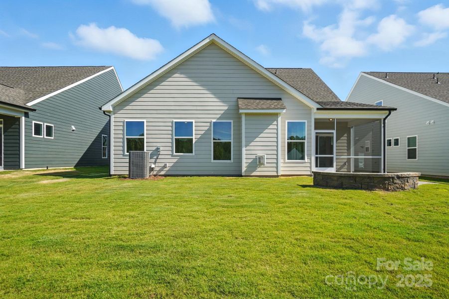 Front exterior of a new home in Heritage - 55+ Community, Indian Trail, NC, highlighting curb appeal (Image 24). Front exterior of a new home in Heritage - 55+ Community, Indian Trail, NC, highlighting curb appeal (Image 24).