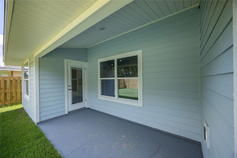 Exterior details and patio area of a home in Country Way South, Newberry (Image 3).