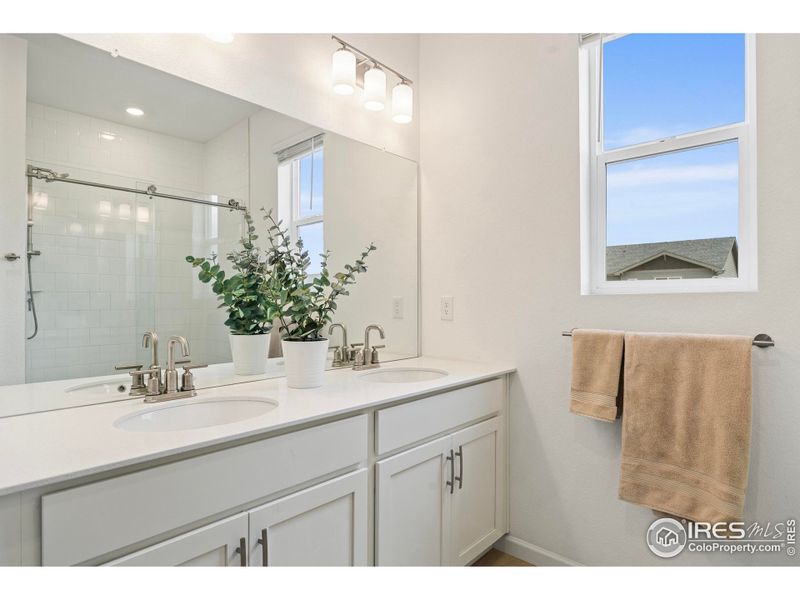 primary ensuite bath with custom tiled/glass shower