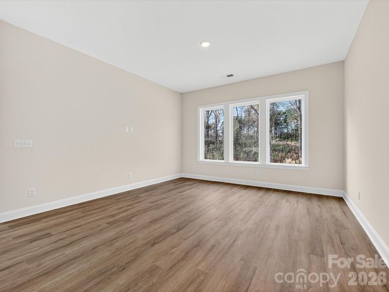 Spacious, unfurnished interior of a new home in North Creek Village, Huntersville (Image 32).