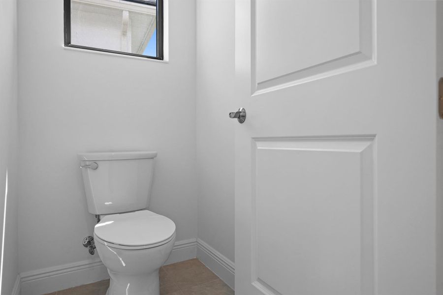 Furnished interior view inside a new home in Cresswind Palm Beach at Westlake, The Acreage (Image 36).