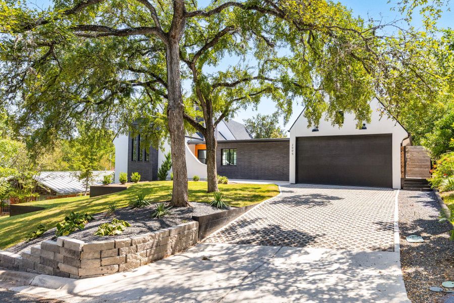 Front exterior of a new home in , Austin, TX, highlighting curb appeal (Image 21).