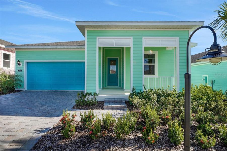 Exterior details and patio area of a home in Green Key Village, Lady Lake (Image 20).
