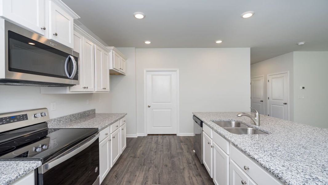 Representative furnished interior of a home built from the GALEN by D.R. Horton in Ridgefield, Conway (Image 6).