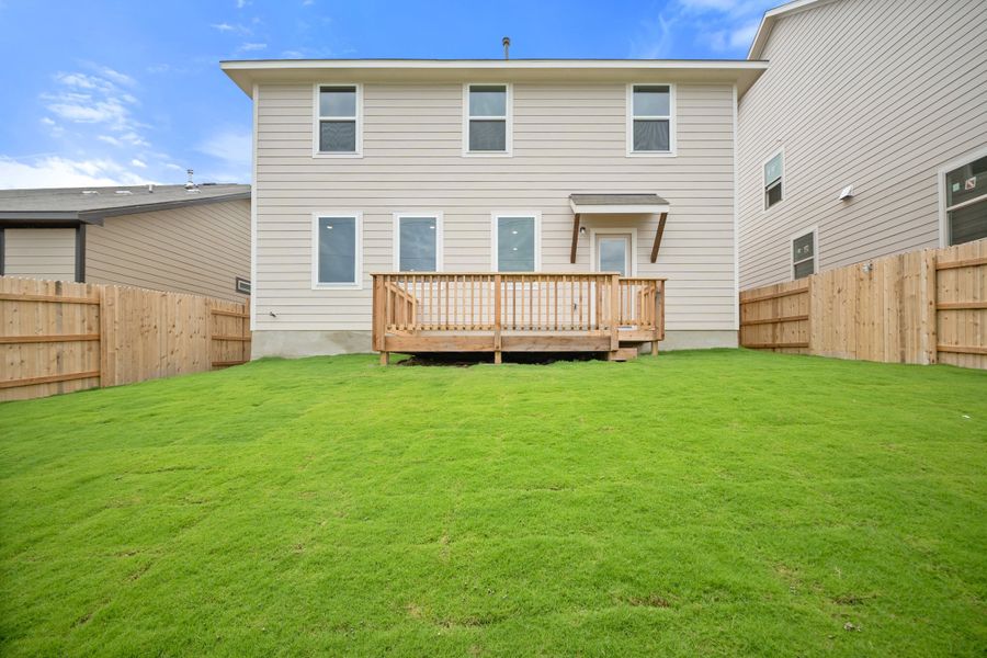 Representative exterior photo of a completed home built from the Sierra by Ashton Woods in Berry Creek Highlands, Georgetown, TX (Image 26).