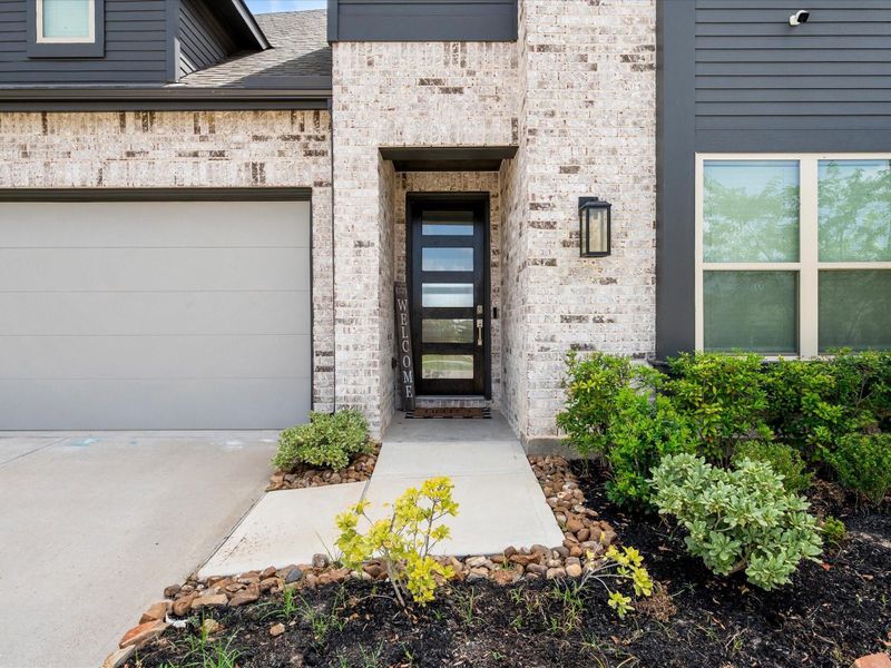 Exterior details and patio area of a home in Emory Glen, Magnolia (Image 21).