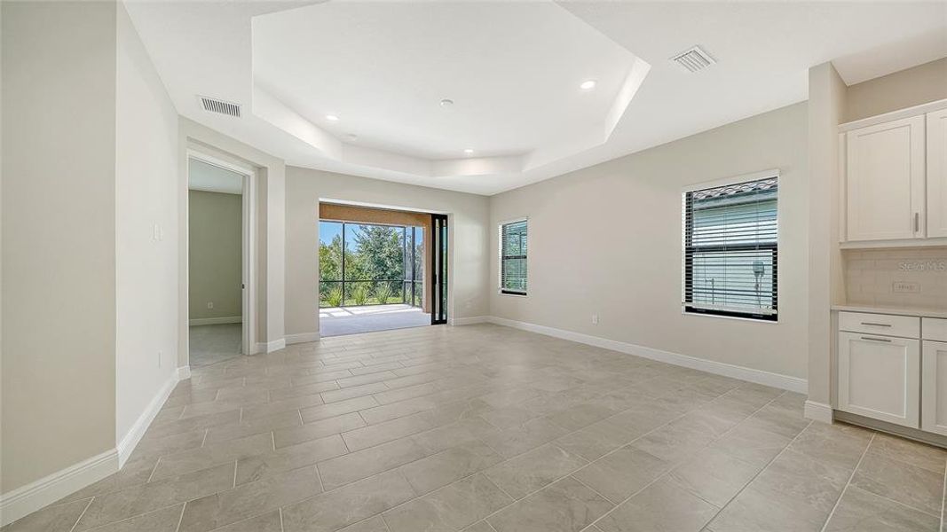 Spacious, unfurnished interior of a new home in Vicenza Real Estate and Homes for Sale in North Venice, FL - Neal Communities, Nokomis (Image 16).