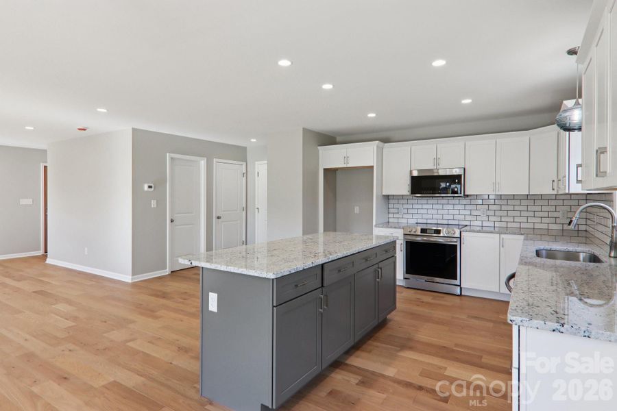Furnished interior view inside a new home in , Candler (Image 7). Furnished interior view inside a new home in , Candler (Image 7).