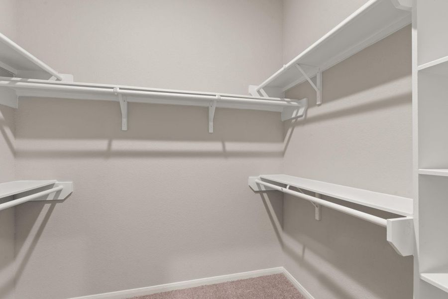 Large walk-in closet in the Primary bedroom.
