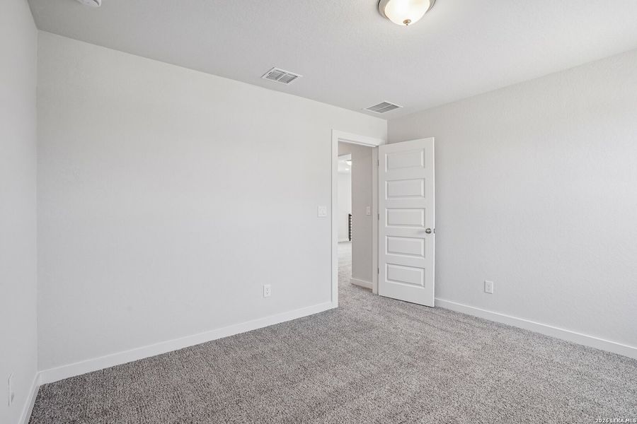 Spacious, unfurnished interior of a new home in August Fields, New Braunfels (Image 37).