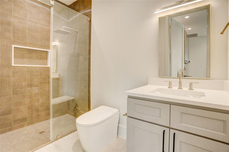 Ensuite bathroom with walk-in shower.