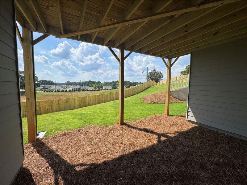 Exterior details and patio area of a home in Rosewood Lake Preserve, Hoschton (Image 18).