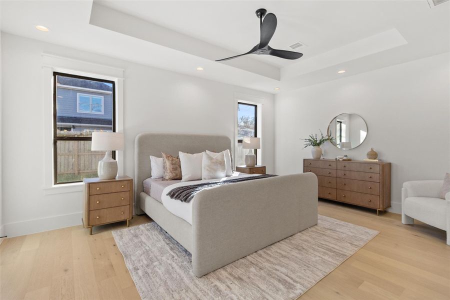 This angle highlights just how airy and balanced the room feels, with soft natural light, wide-plank flooring, and a layout that gives you flexibility for seating, dressers, or a cozy reading corner. Every detail works together to create a space that feels calm, grounded, and undeniably comfortable.