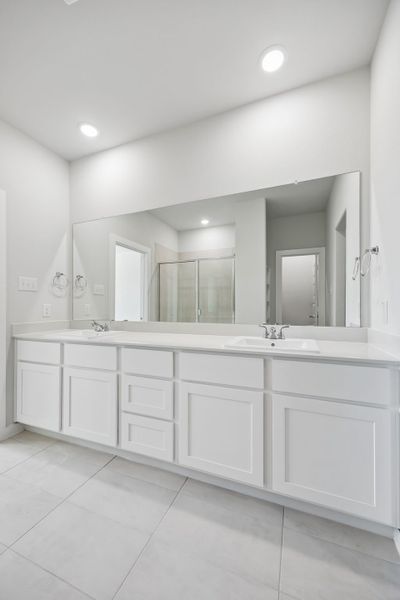 Primary Bathroom in the Mesquite home plan by Trophy Signature Homes – REPRESENTATIVE PHOTO