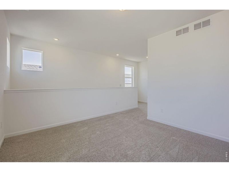 Spacious, unfurnished interior of a new home in Country Club Reserve, Fort Collins (Image 42).
