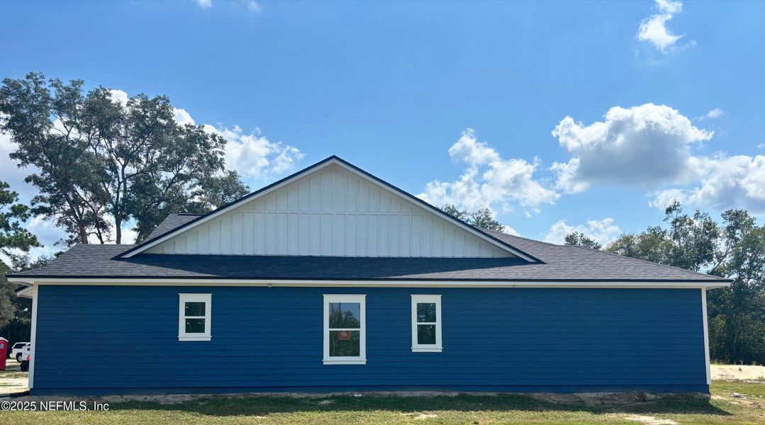 Front exterior of a new home in , Melrose, FL, highlighting curb appeal (Image 10).