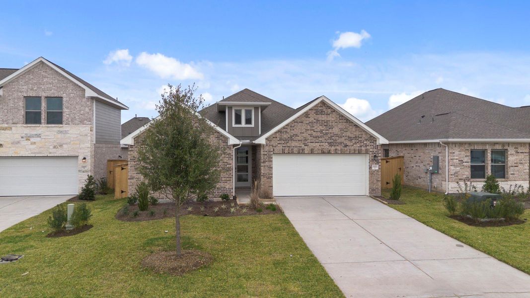 Front exterior of a new home in Windrose Green 50', Angleton, TX, highlighting curb appeal (Image 21).