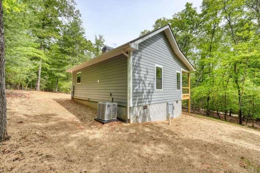 Exterior details and patio area of a home in , Blairsville (Image 16).