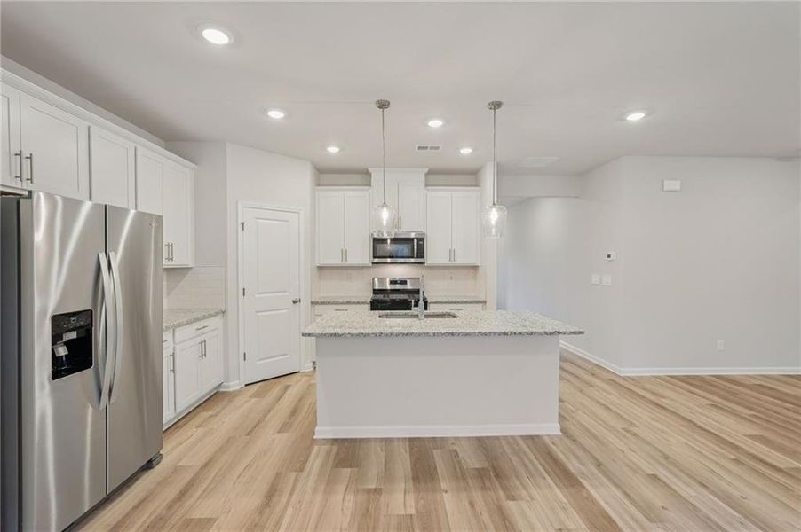Furnished interior view inside a new home in Harmony Manor, Fairburn (Image 12).