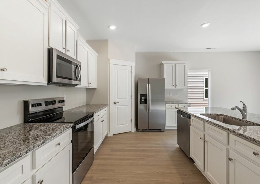 The kitchen has granite countertops The kitchen has granite countertops