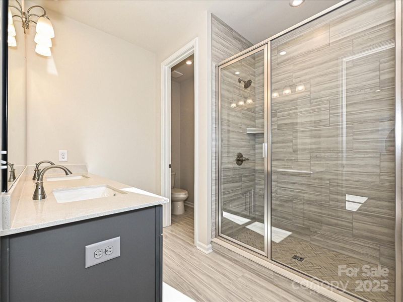 En Suite Primary Bath Outfitted with Designer Finishes. En Suite Primary Bath Outfitted with Designer Finishes.