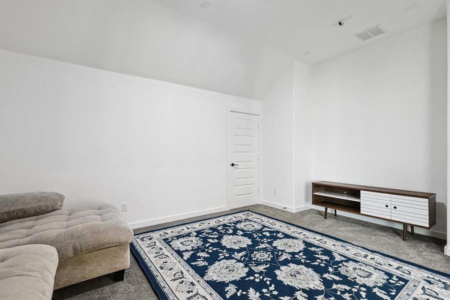 Sitting room with carpet floors