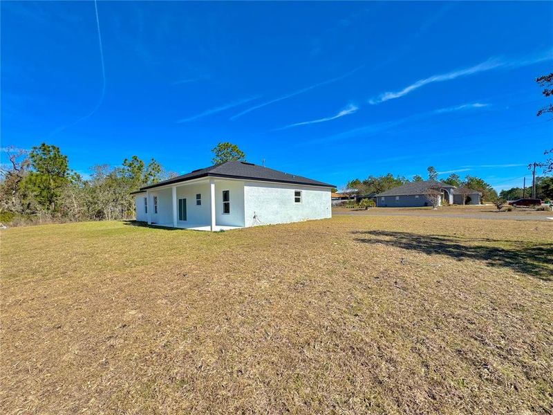 Exterior details and patio area of a home in , Citrus Springs (Image 21).