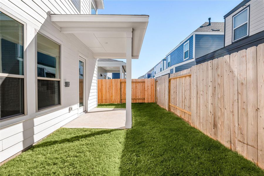 Enjoy a private, fenced backyard with a covered patio, ideal for relaxing outdoors or hosting casual gatherings in your own quiet retreat. Enjoy a private, fenced backyard with a covered patio, ideal for relaxing outdoors or hosting casual gatherings in your own quiet retreat.
