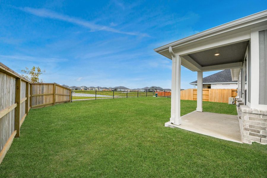 Exterior details and patio area of a home in Laurel Landing: Landmark Collection, Alvin (Image 4).