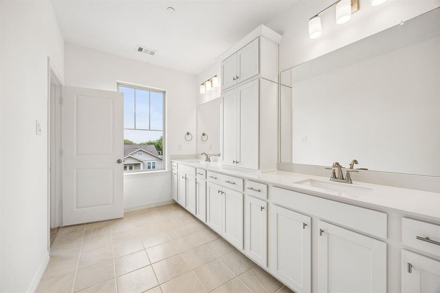Plenty of space for two in this wonderful owner's bath.