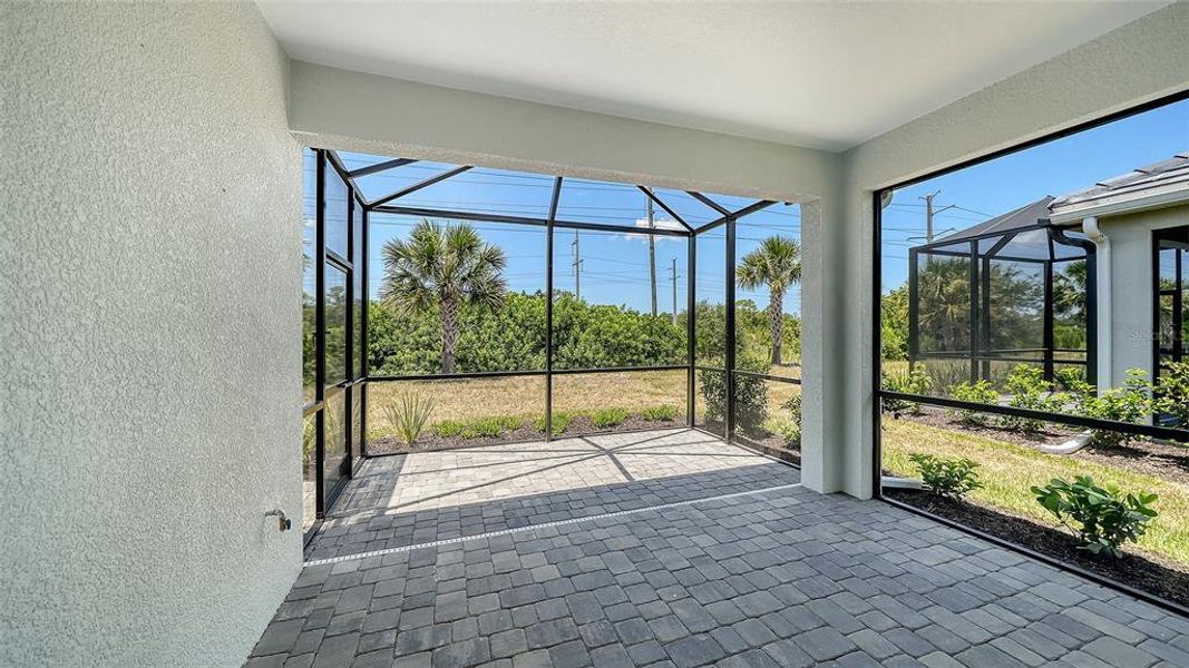 Exterior details and patio area of a home in Windward Real Estate and Homes for Sale in Sarasota, FL - Neal Communities, Lakewood Ranch (Image 21).