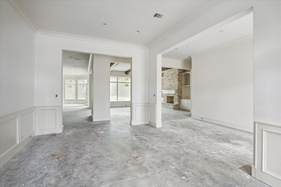 Progress photo from December 2025 - Dining Room, opens up to foyer, living room, and kitchen