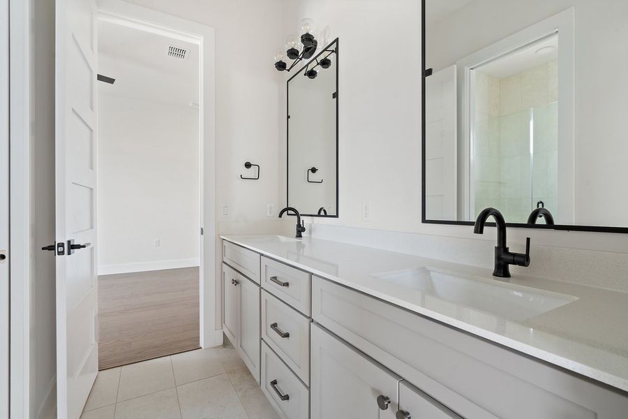 Furnished interior view inside a new home in Milky Way at River Place, Austin (Image 28).