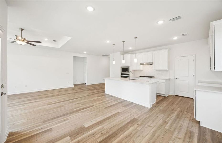 Kitchen open to living and dining area