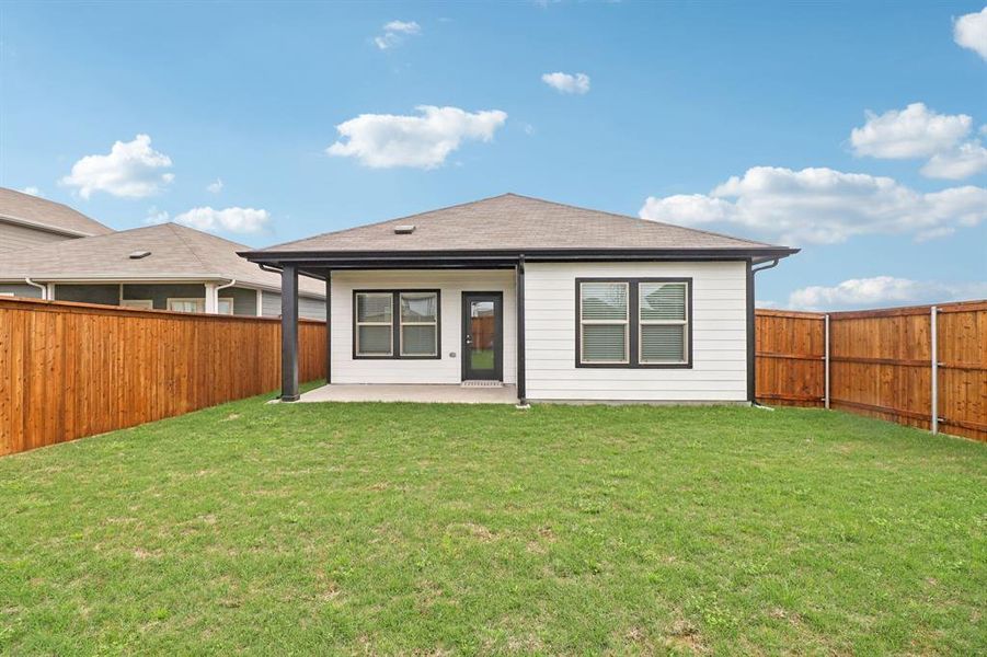 Exterior details and patio area of a home in Lakehaven - Spring Series, Farmersville (Image 21).