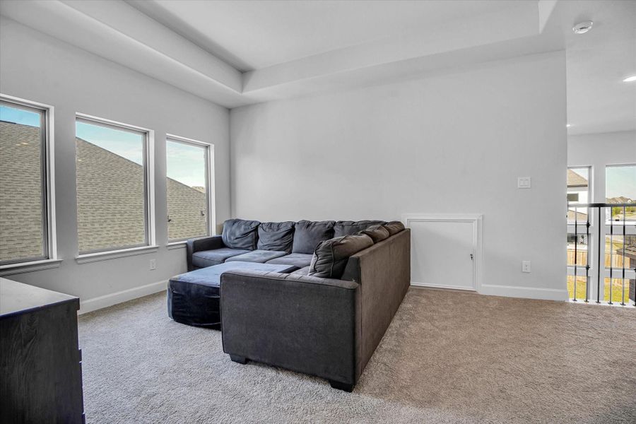 Furnished interior view inside a new home in Bridgeland 55', Cypress (Image 1).